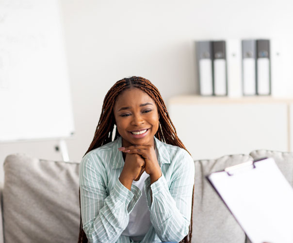 young-happy-woman-doing-psychotherapy-session